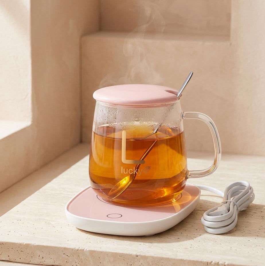 TAZA TRANSPARENTE CON CALENTADOR ROSADO