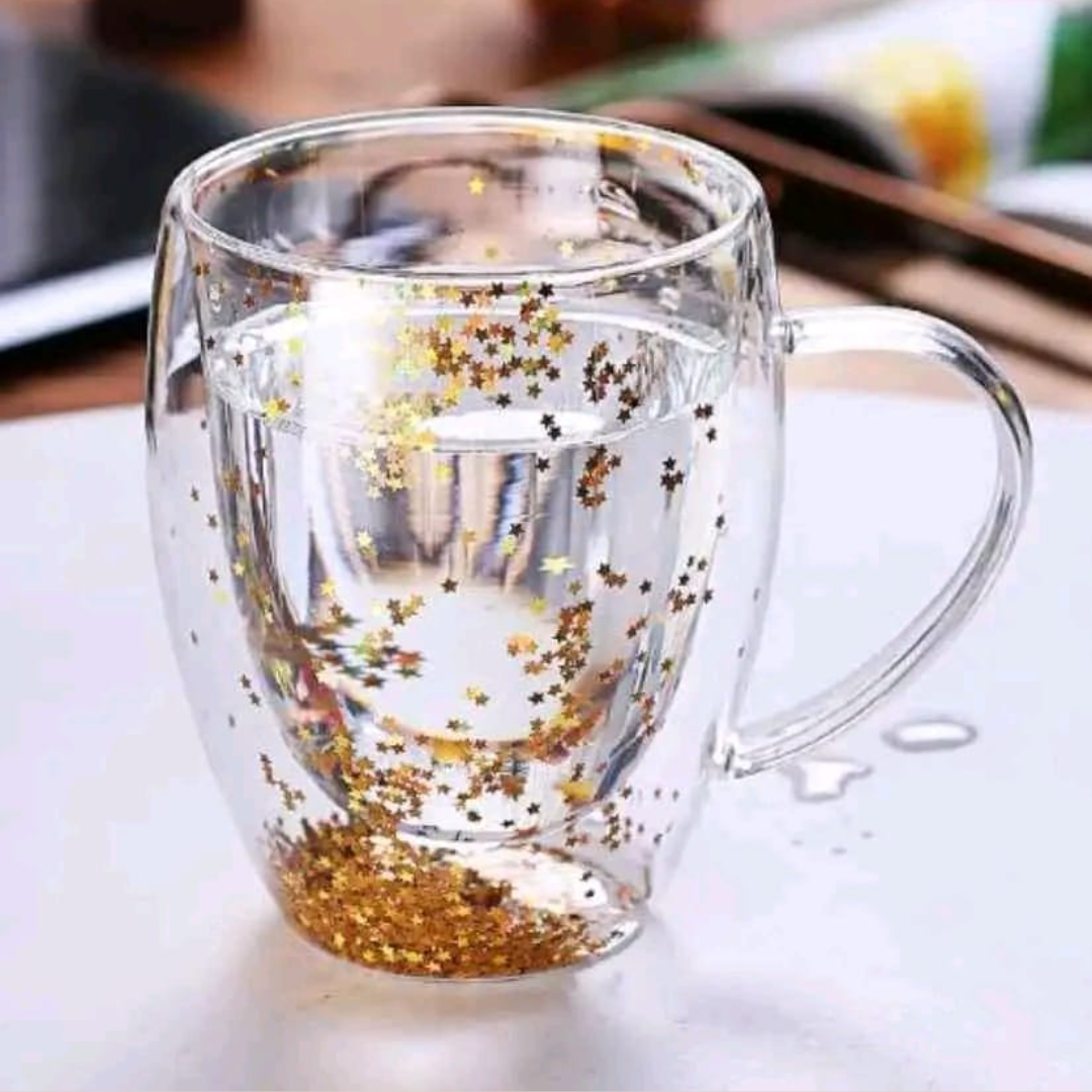 TAZA DE VIDRIO TRANSPARENTE DOBLE CAPA CON ESTRELLAS DORADAS EN EL FONDO