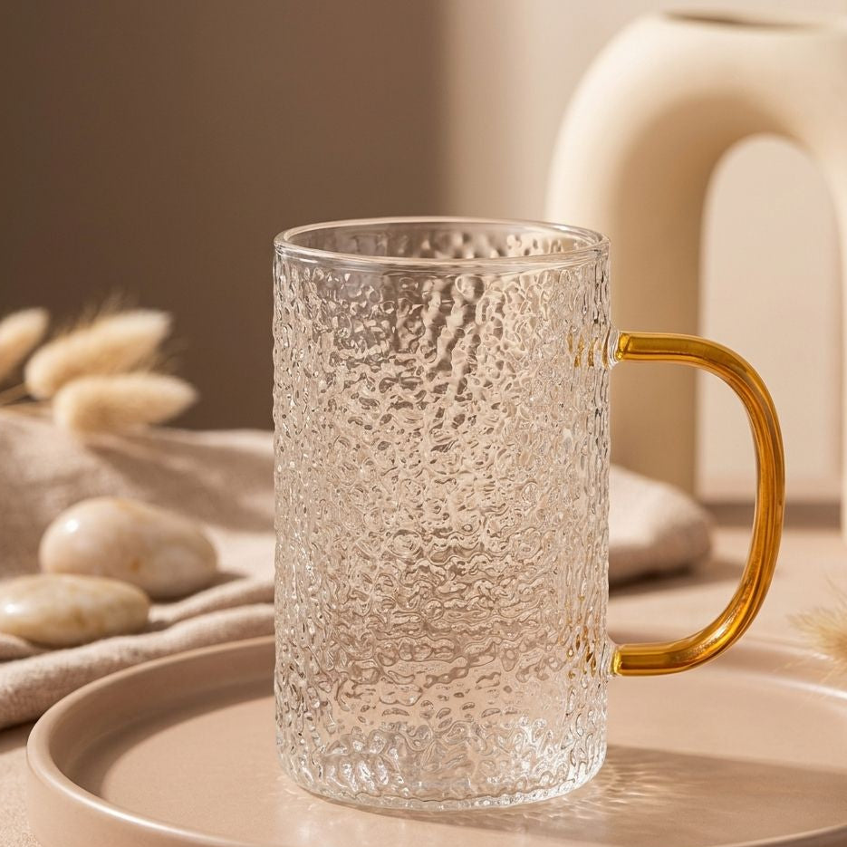 TAZA DE VIDRIO CON ASA DORADA