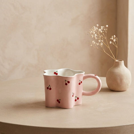 TAZA ROSADA Y CERECITAS CON FORMA DE ESTRELLA