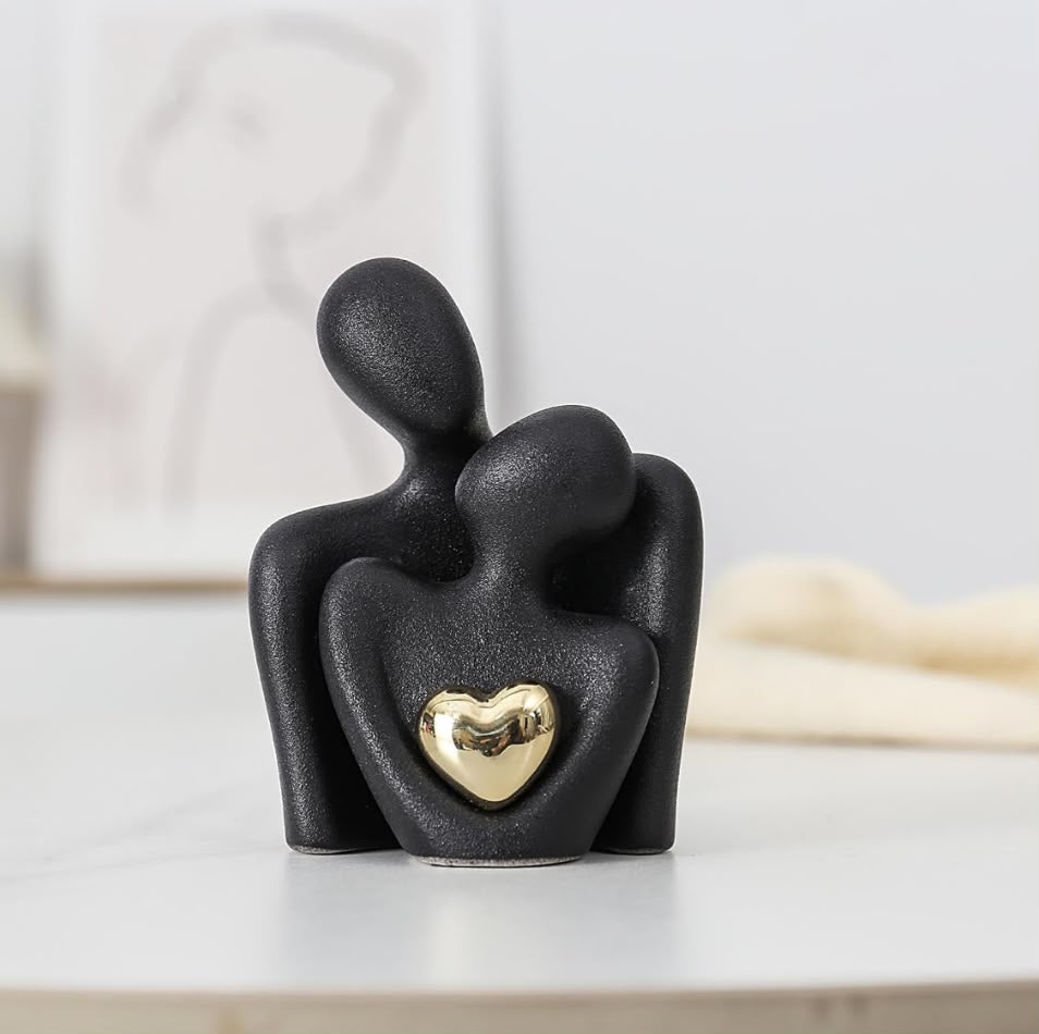 ESTATUA DE PAREJA DE CERAMICA