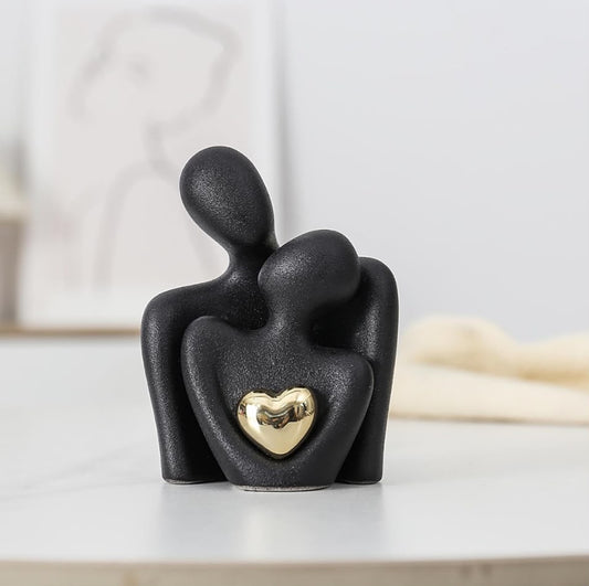 ESTATUA DE PAREJA DE CERAMICA