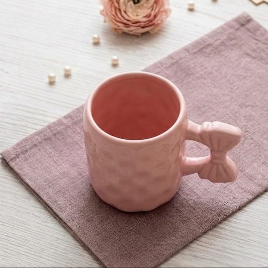 TAZA ROSADA CON ASA DE LAZO