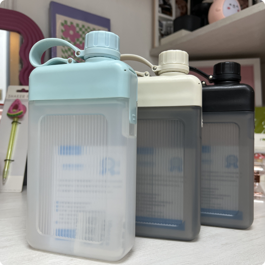 BOTELLA VIAJERA GRIS, AZUL Y NEGRO