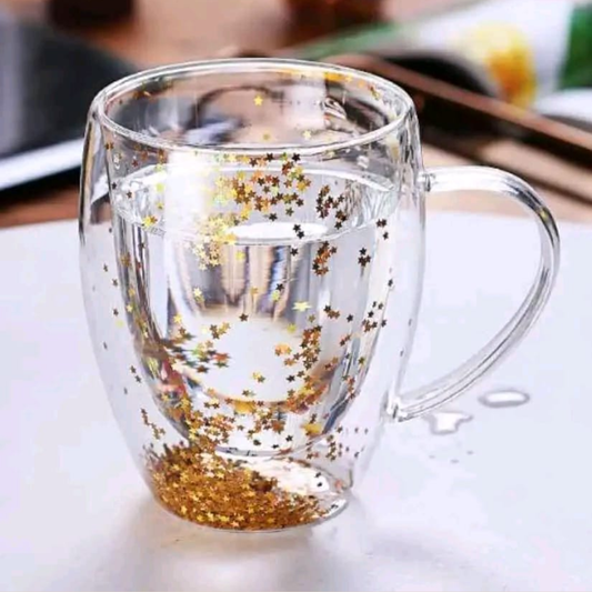 TAZA DE VIDRIO TRANSPARENTE DOBLE CAPA CON ESTRELLAS DORADAS EN EL FONDO