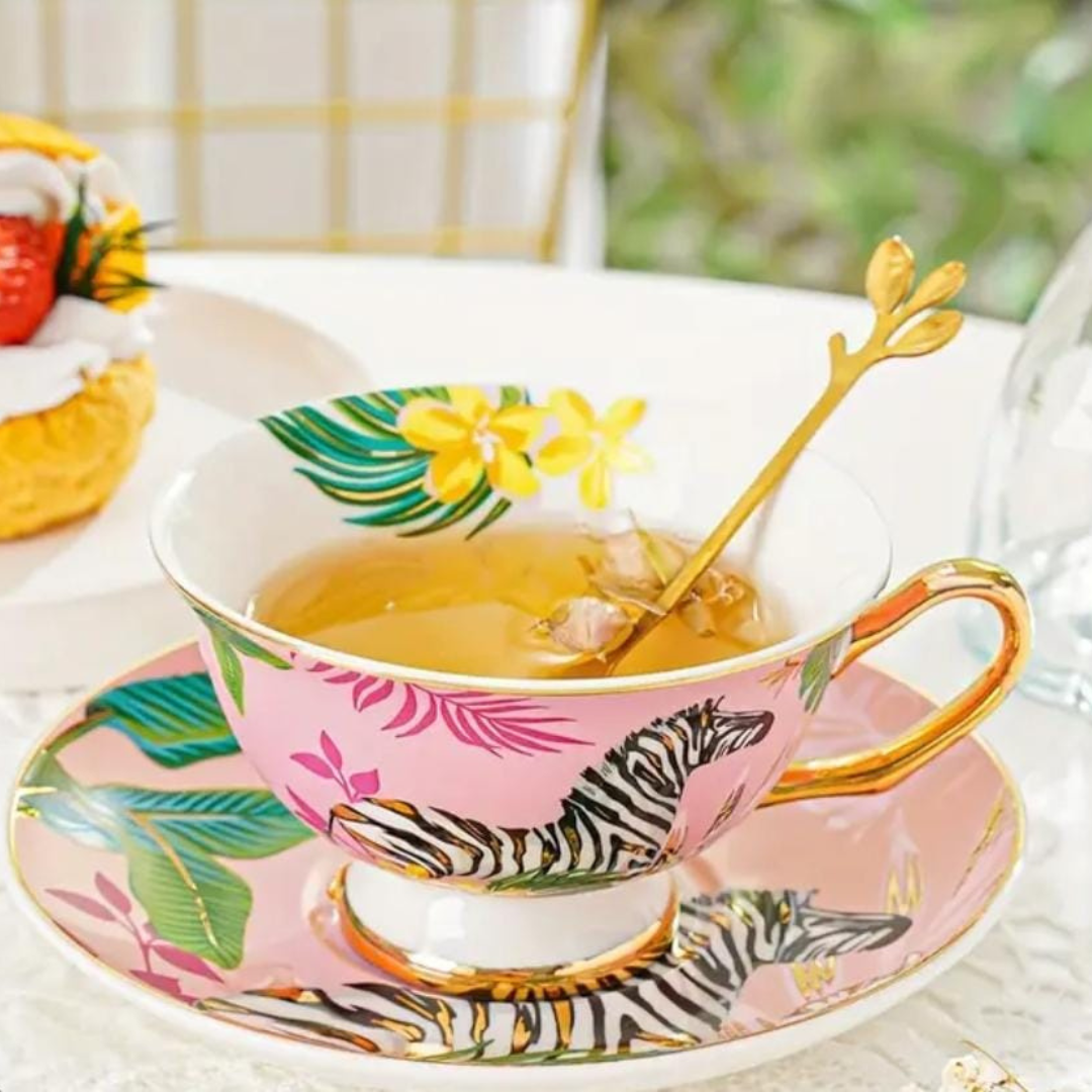 TAZA ELEGANTE CON ASA DORADA DISEÑO VARIADO CEBRA