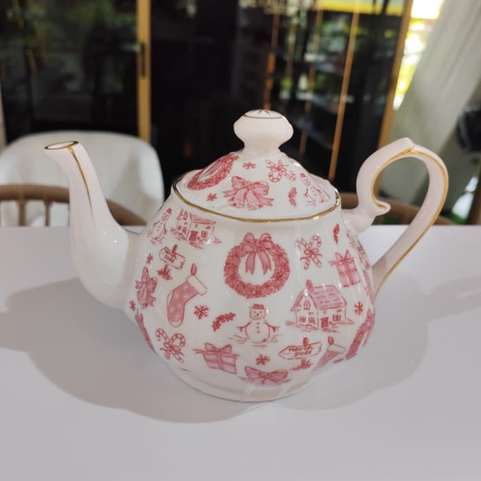TETERA DE PORCELANA BLANCA CON DISEÑO NAVIDAD ROSADO