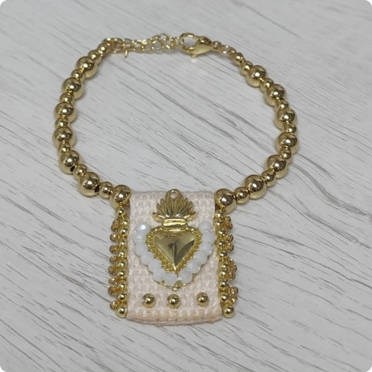 PULSERA CORAZÓN TEJIDO
