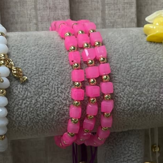 PULSERA MORADA CON DORADO Y ROSADO