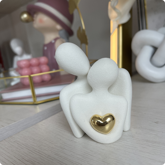 PAREJA BLANCA CON CORAZÓN DORADO
