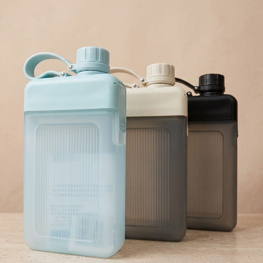 BOTELLA VIAJERA GRIS, AZUL Y NEGRO