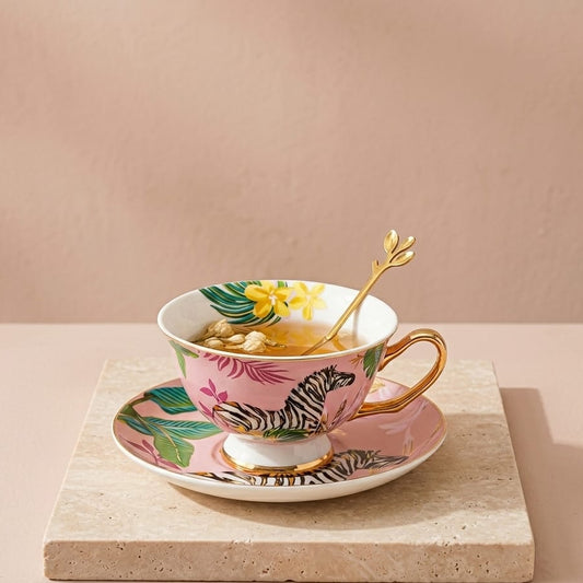 TAZA ELEGANTE CON ASA DORADA DISEÑO VARIADO CEBRA
